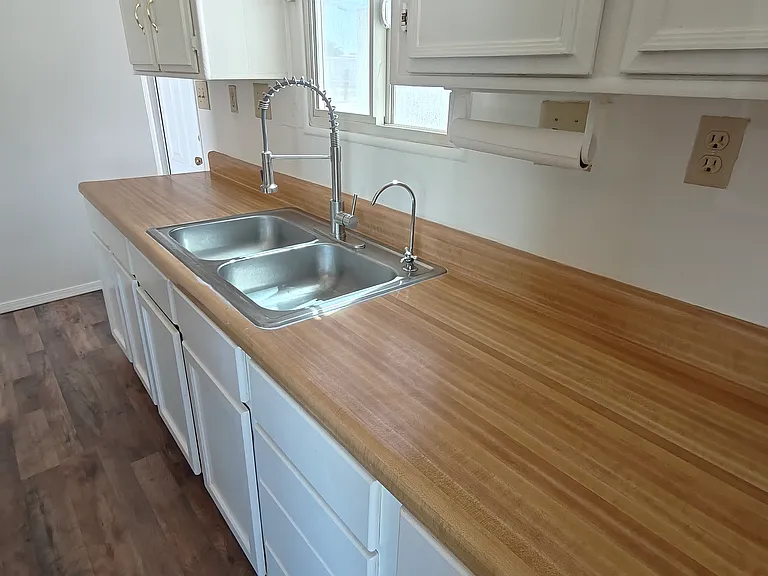 Sink side of Kitchen. Purified water at the the sink
