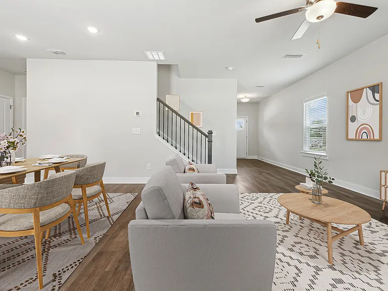 Overlook of the living room and staircase.