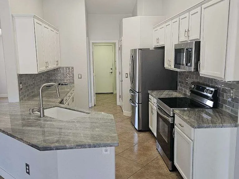 7604 E Downing St — Photo 26