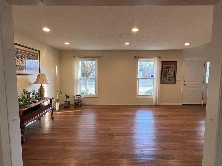 Living room with front door.