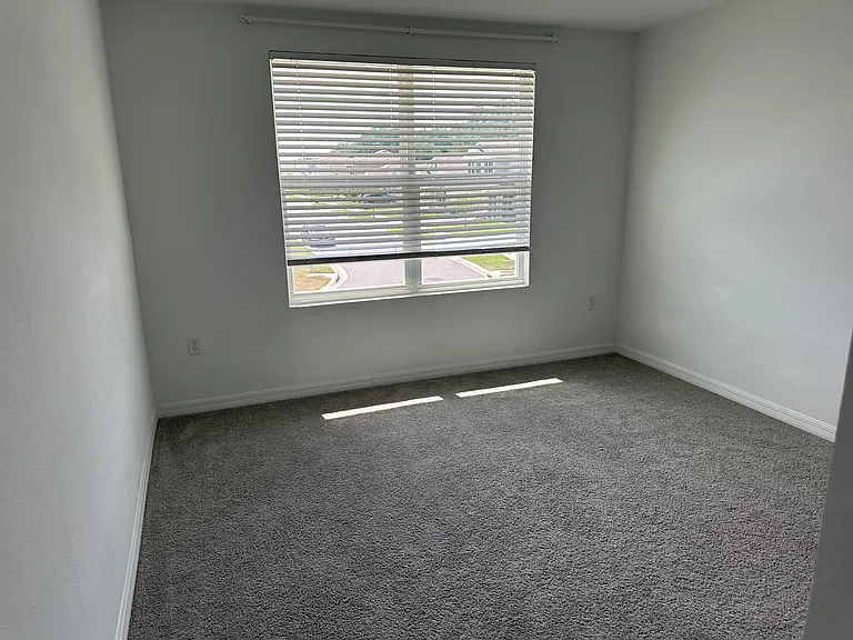 7715 Rosewood Garden Loop — Photo 15