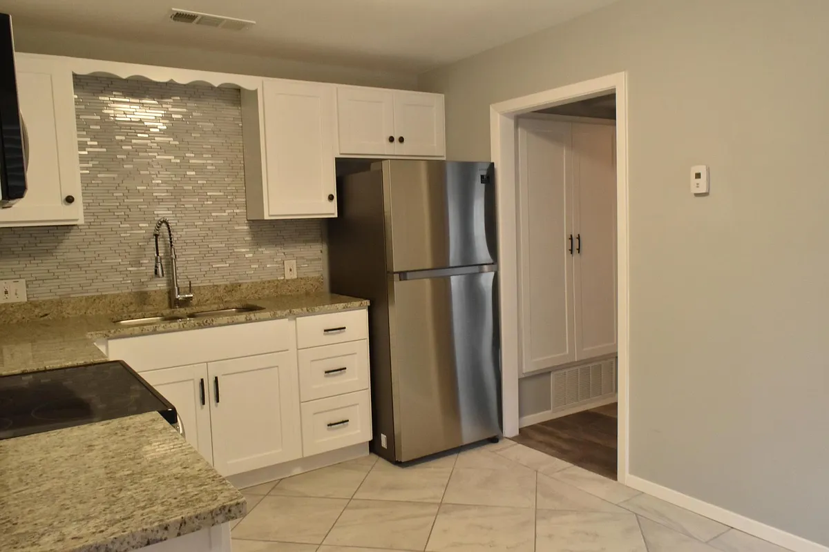 Kitchen to hallway - 635 Winston St #1