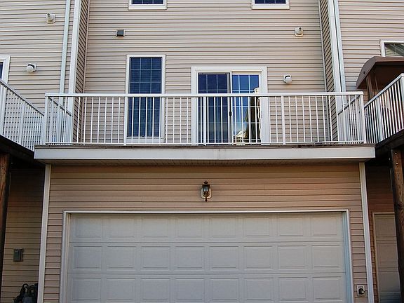 Two car garage with balcony over.