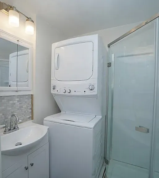 Bathroom 1 with laundry - Adjacent to Bedroom 1