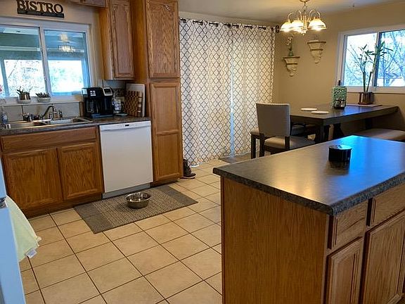 Open kitchen, walk out to the large covered deck.