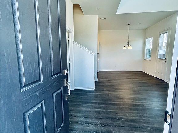 Luxury vinyl flooring. High ceilings.