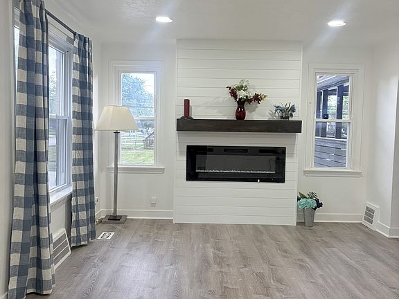 Living room area with electric 
fireplace