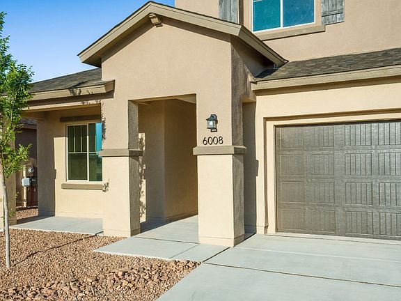 The landscaped front yard is easy to maintain and adds additional curb appeal.
