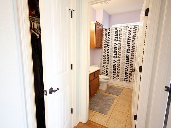 Entryway closet and front guest bathroom