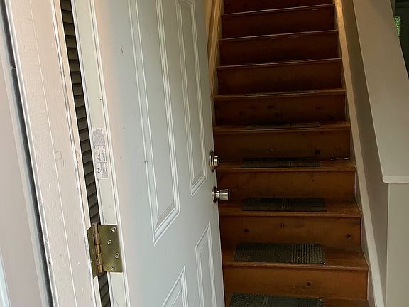 Main floor entrance and stairs to upstairs