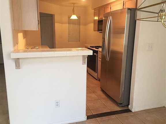 2nd image of 8437 Pacific Fountain Ave #0