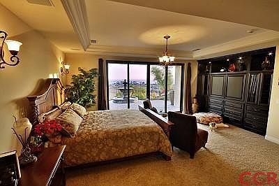 Master Bedroom features a private patio with an ocean view.