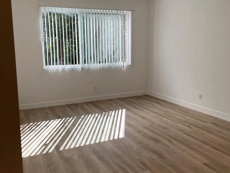 2nd Bedroom, with large window.