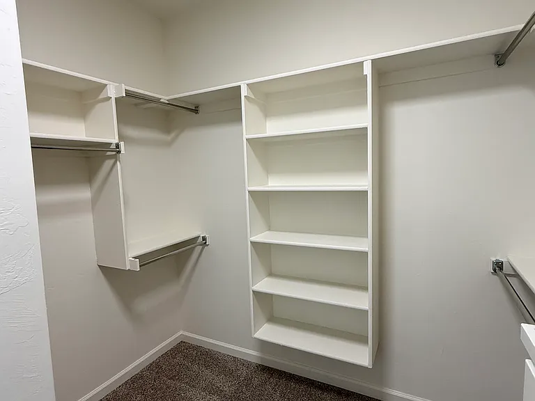 Primary Bedroom Walk in Closet #1
