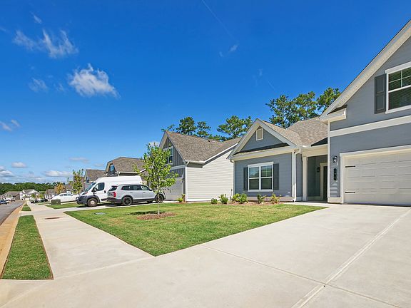 Exterior shot of Salem Oaks, two story homes with a private driveway and attached garage.