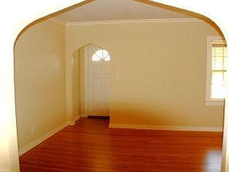 Entry with door bell, matching light fixture to sconces, entry closet