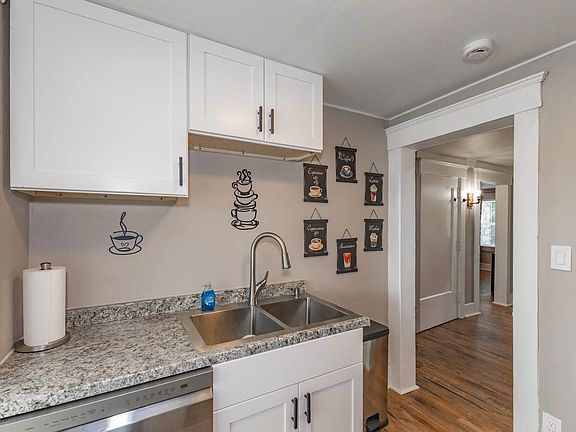 Fully equipped kitchen including a dishwasher for your convenience.
