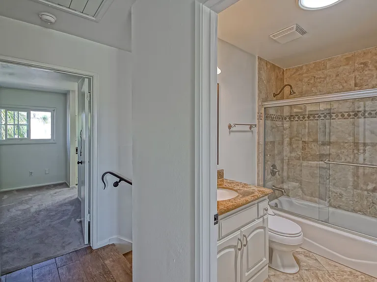 7148 Island Village Dr — Photo 28