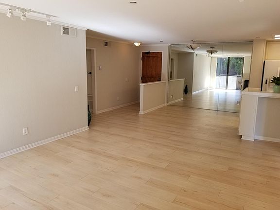 Entry way and dining area, taken from the living room.