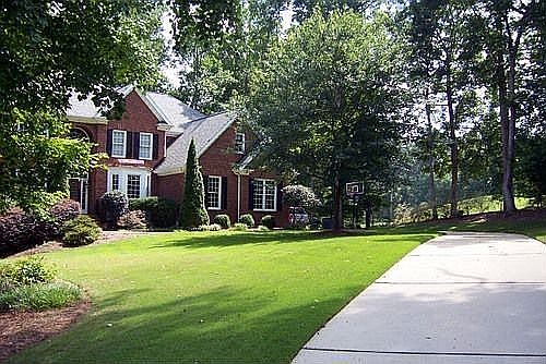 Private wooded .87 acre golf course lot on cul de sac