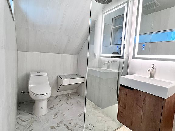 Elegant, modern bathroom design. Diverse lighting options adaptable to your specific needs.