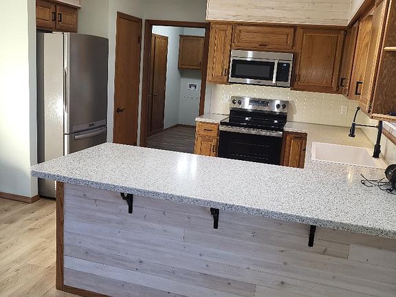 Kitchen with view to Laundry / Mudroom area