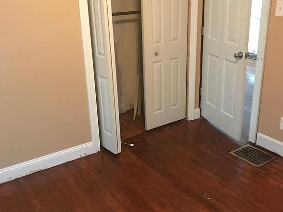 Front bedroom looking out with closet