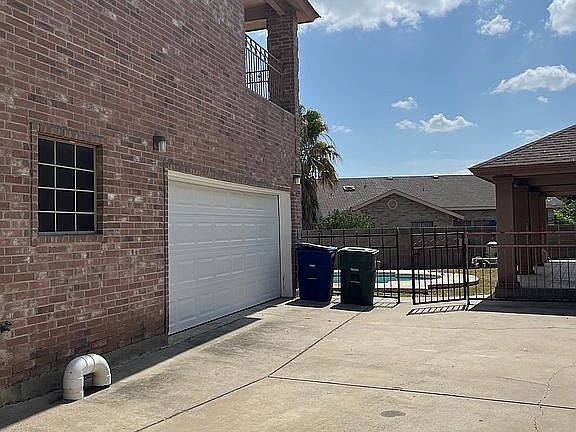 Side exterior, 2 car garage