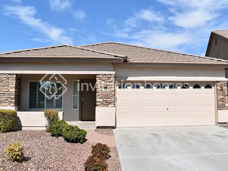 309 S 117th Dr — Photo 1