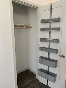 Hallway Closet with Container store "Elfa Door Rack"