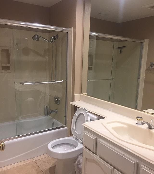 Full bathroom with standing shower/ bathtub