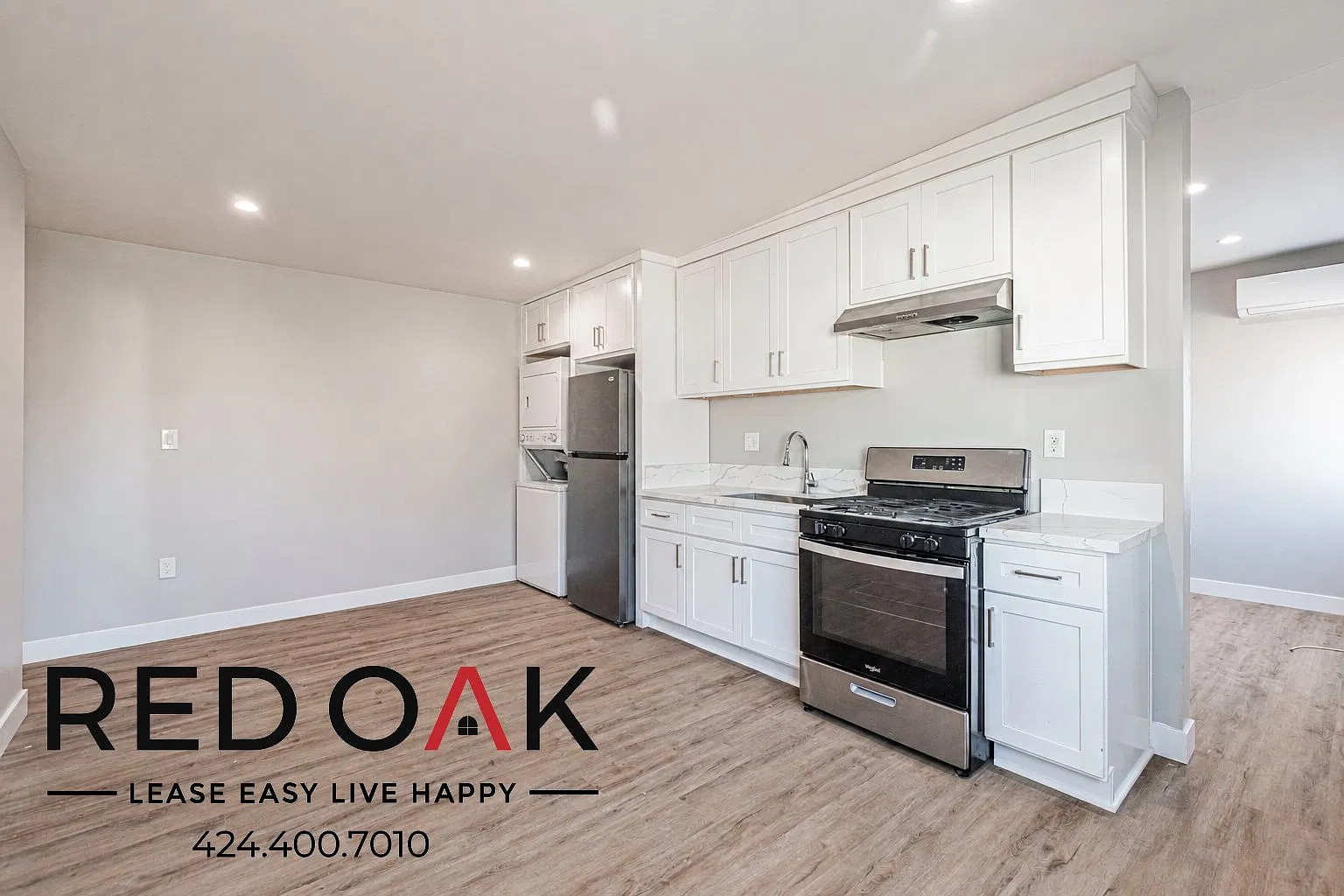 Sunlit 4-Bed with Stainless Steel Appliances, Air Conditioning, In-Unit Laundry and Parking Inclu... — Photo 1