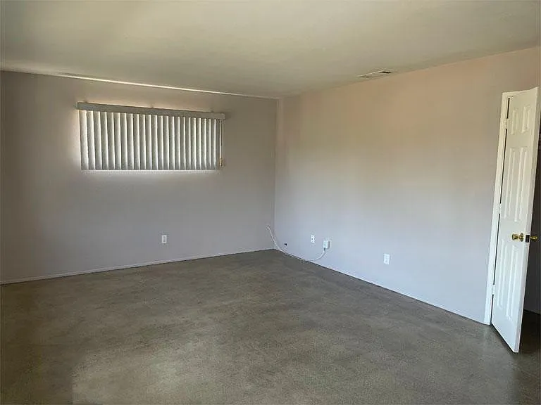 Living Room. South facing window toward cul-de-sac