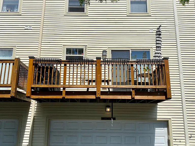 Private balcony above 2 car attached garage