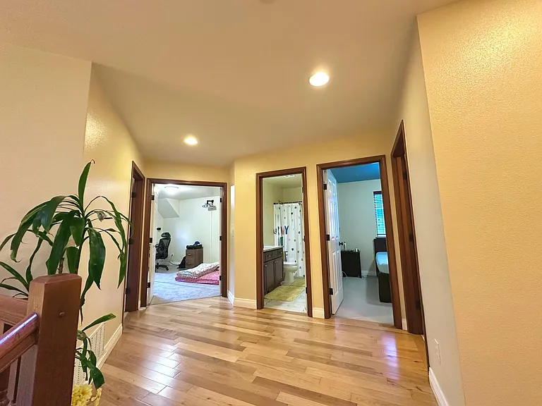 rooms in order bedroom 1, family room, bathroom, bedroom 2, & laundry room