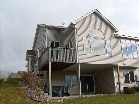 Back of the home, showing patio and deck