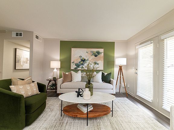 Spacious living room with hardwood-style flooring