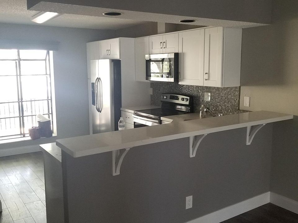 Beautiful kitchen, open concept to living room. Beautiful natural light.