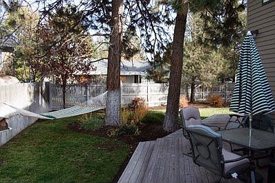 Cool back yard with a huge deck