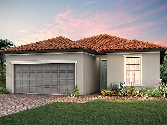 The Wyndham, a one-story family home with a 2 car garage, shown with Home Exterior FM1C