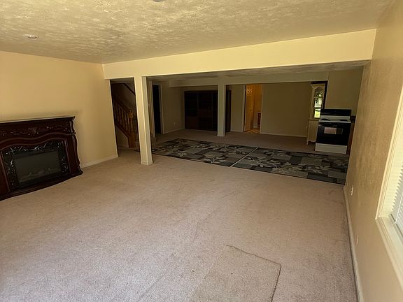 Entry into Livingroom with Fireplace