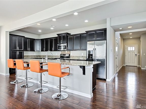 Open floor plan w/ large granite island 