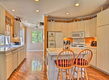 Large kitchen with ample counter and cabinet and a center island