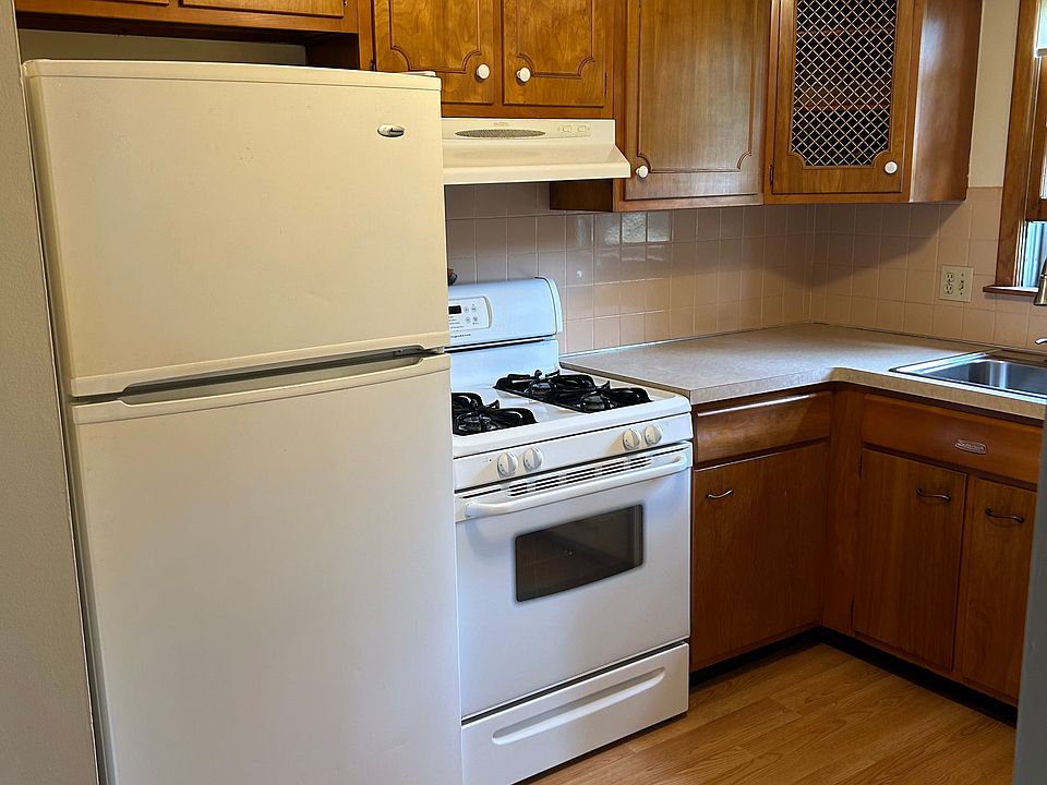 Kitchen Cupboards - stove and refrigerator