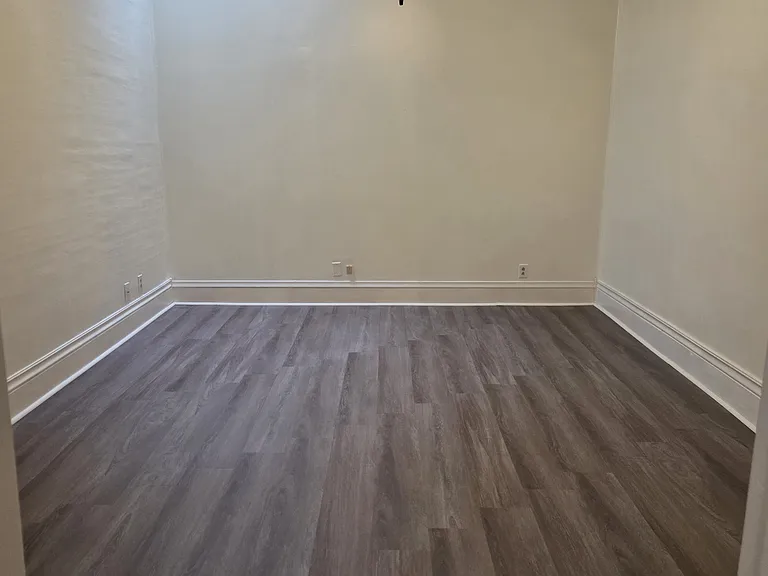 Living room entrance from kitchen with skylight for natural light