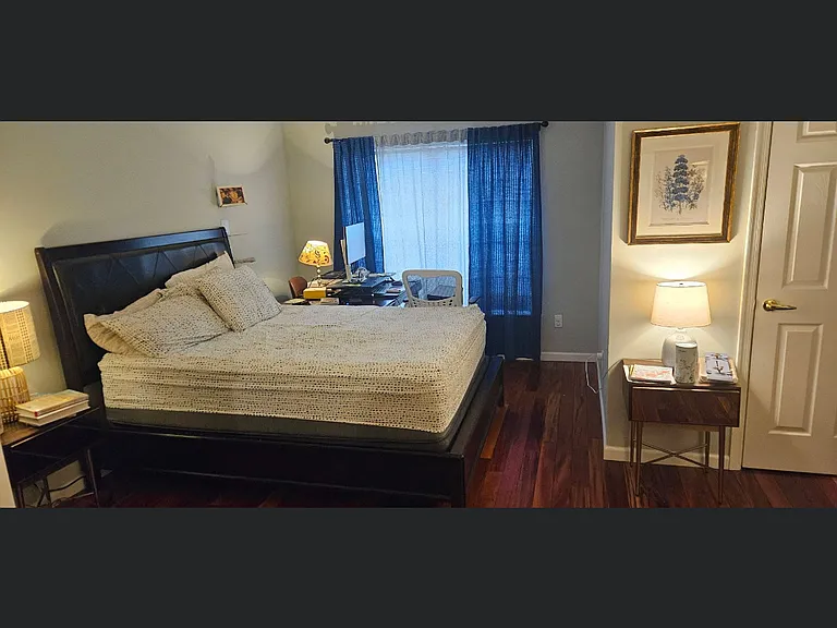 Master bedroom with attached bathroom and walk in closet