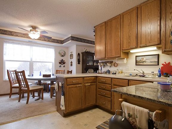 U shaped kitchen opens into the dining room