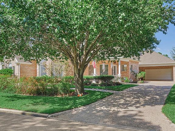 Detached 3 car garage with carport provides desirable curb appeal and a private backyard.