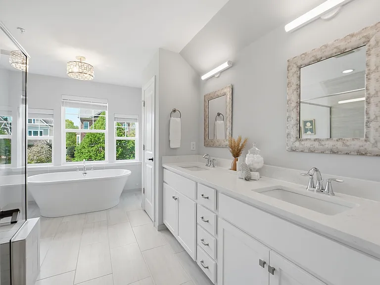 Beautiful en-suite with large shower, soaking tub, and double vanity.