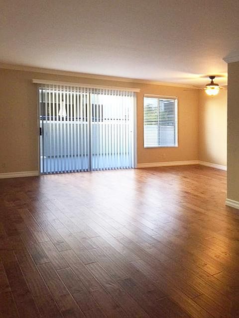 BRAND NEW hardwood floors in living room, dining and hall
